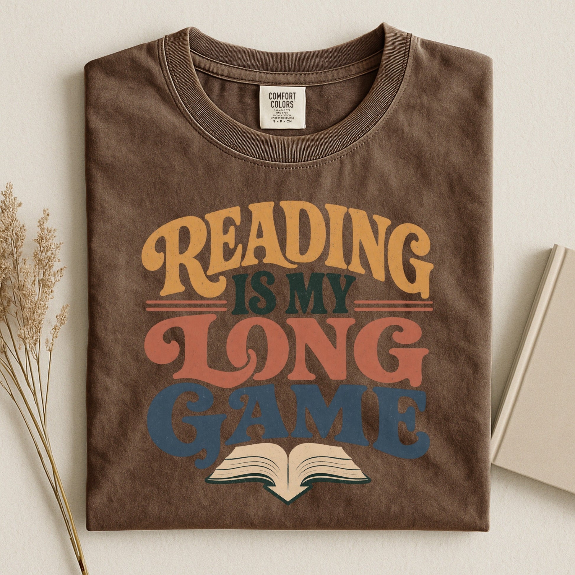 Reading Is My Long Game bookish tee in Espresso, flat lay