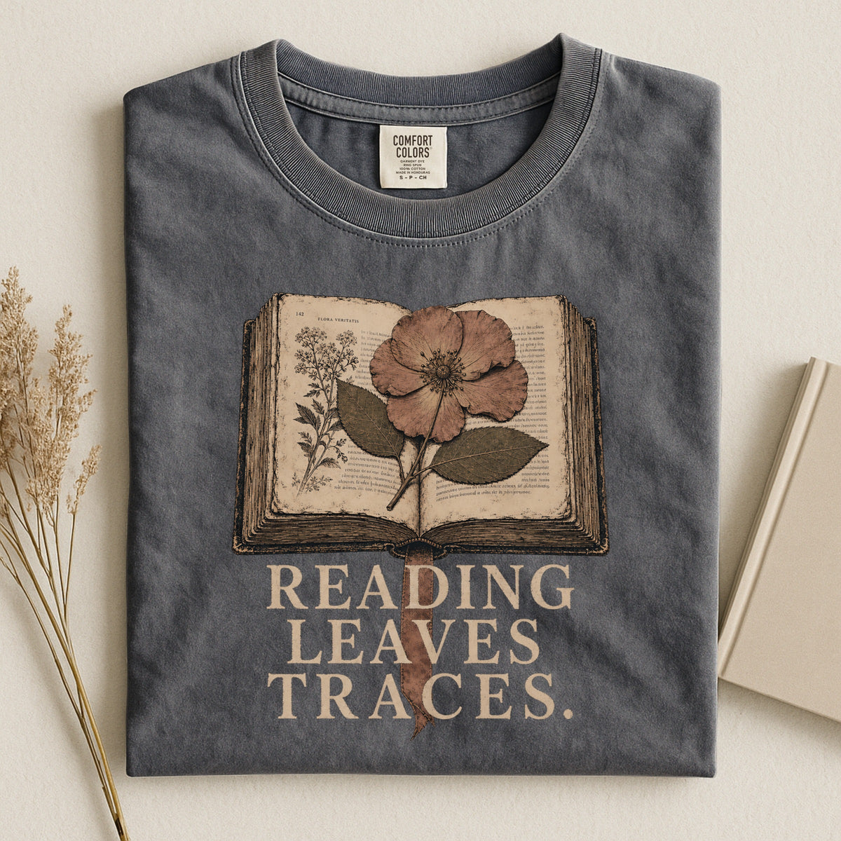 Shelf Love Studio Reading Leaves Traces t-shirt in Pepper, styled flat lay