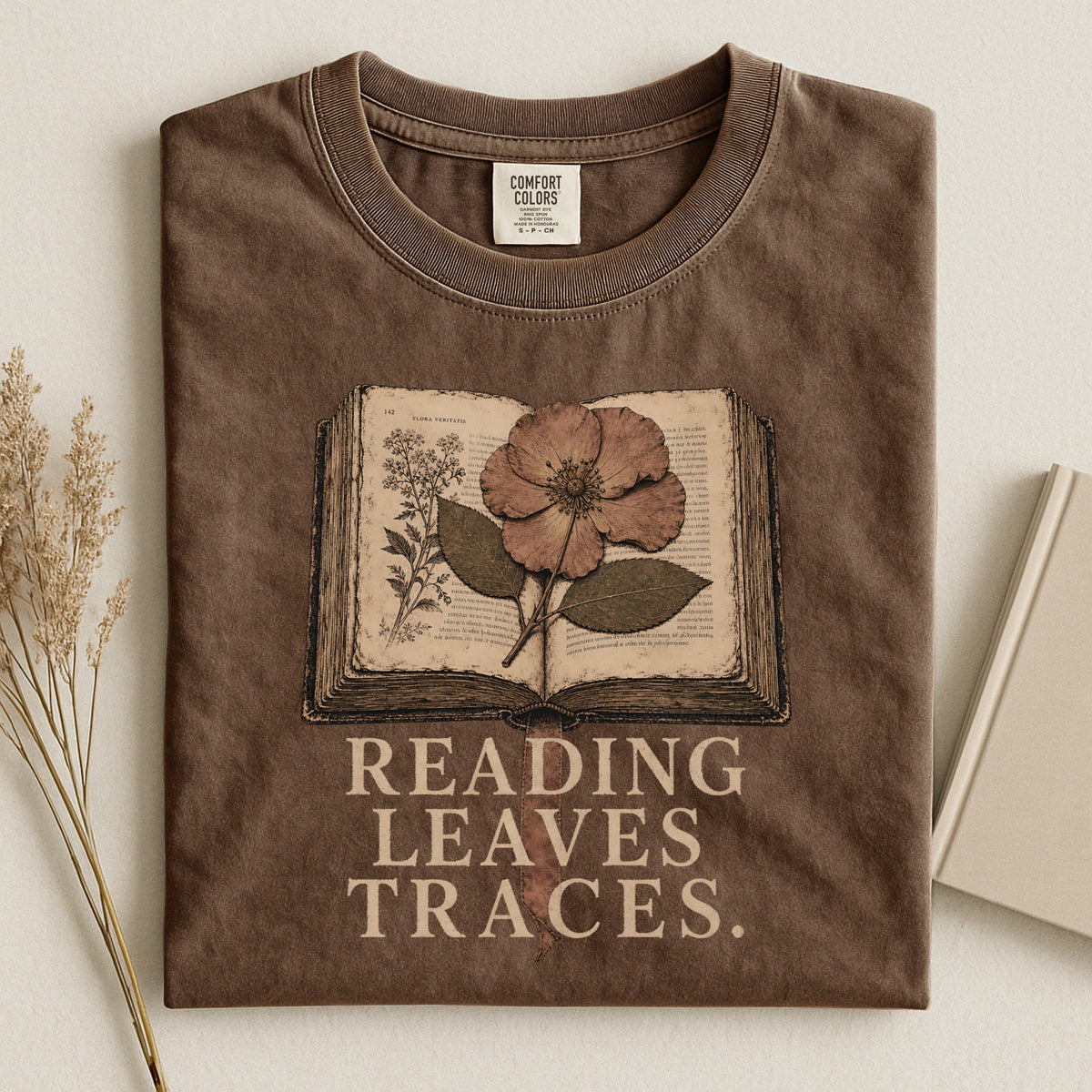 Shelf Love Studio Reading Leaves Traces t-shirt in Espresso, styled flat lay