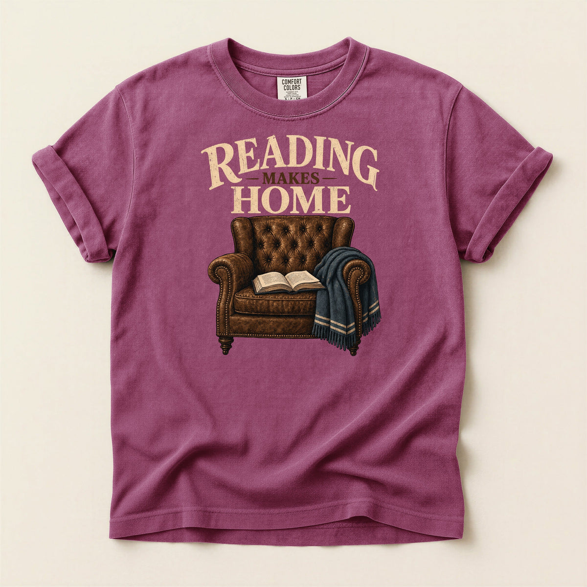 Shelf Love Studio Reading Makes Home t-shirt in Berry, flat
