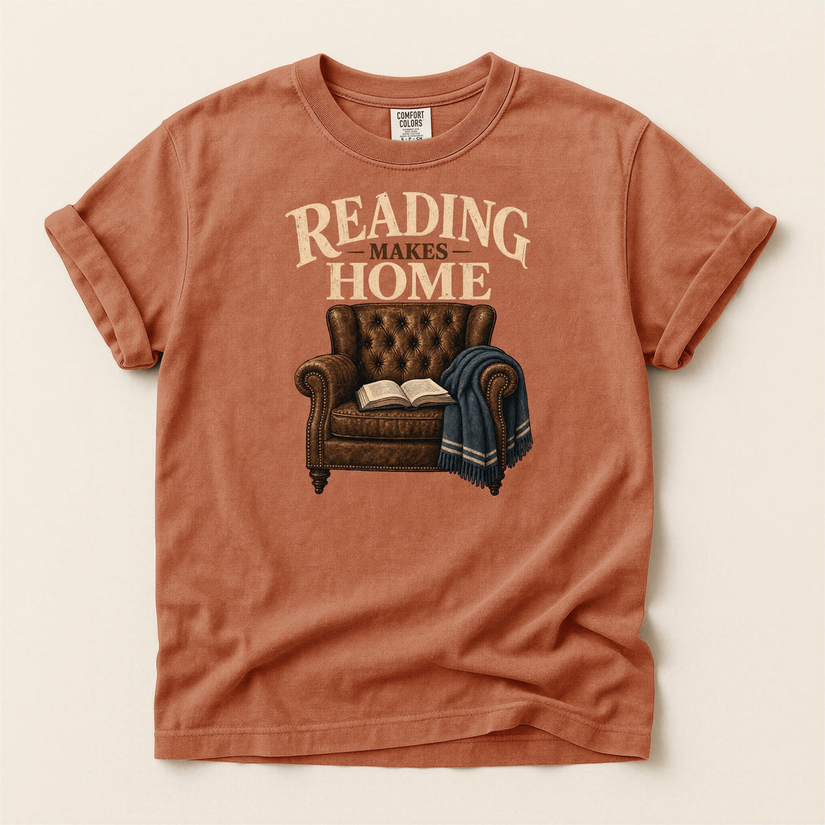 Shelf Love Studio Reading Makes Home t-shirt in Yam, flat
