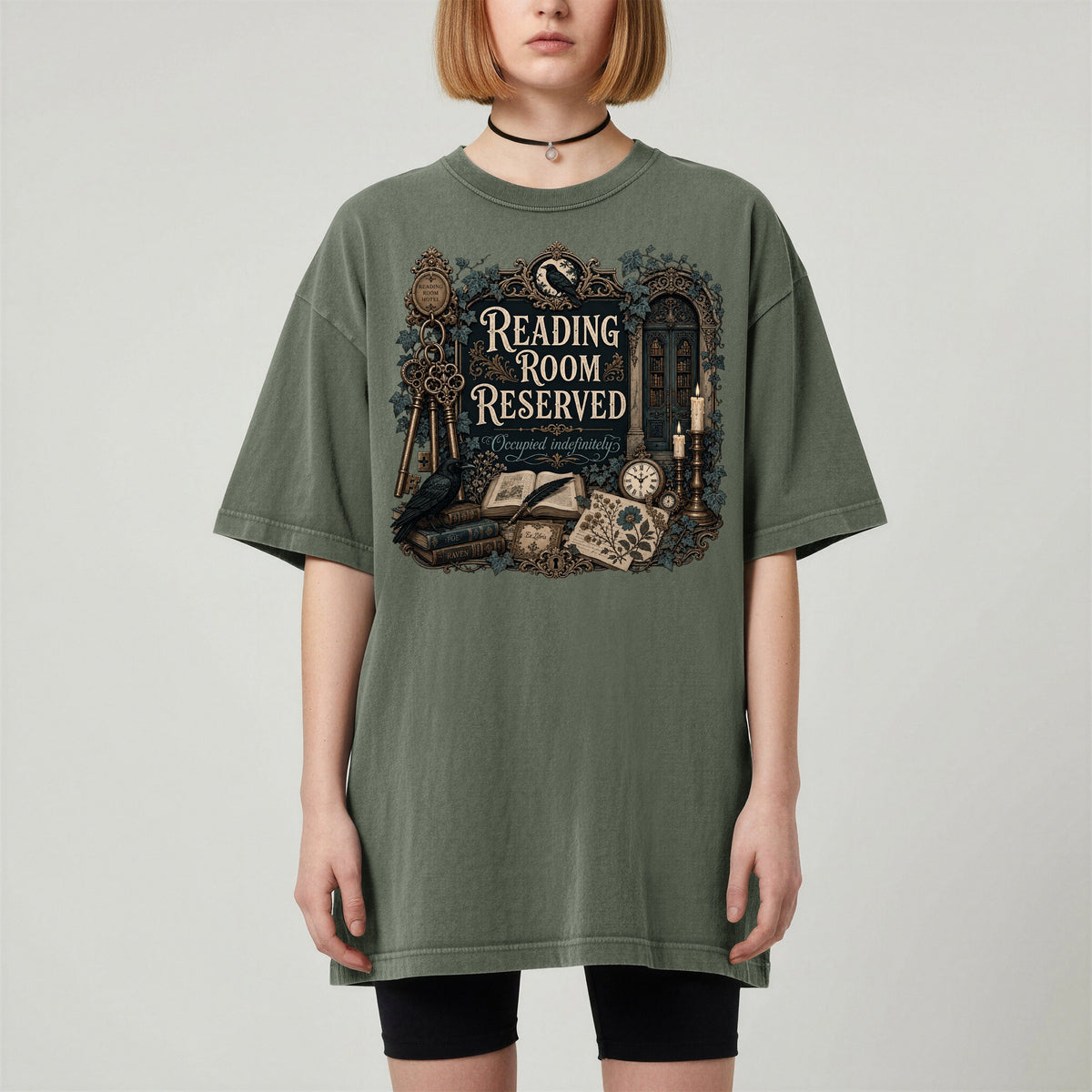 Reading Room Reserved bookish tee in Moss, worn