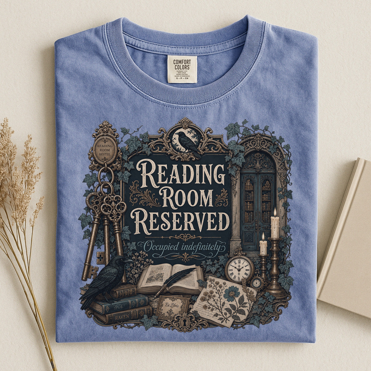 Reading Room Reserved bookish tee in Blue Jean, flat lay