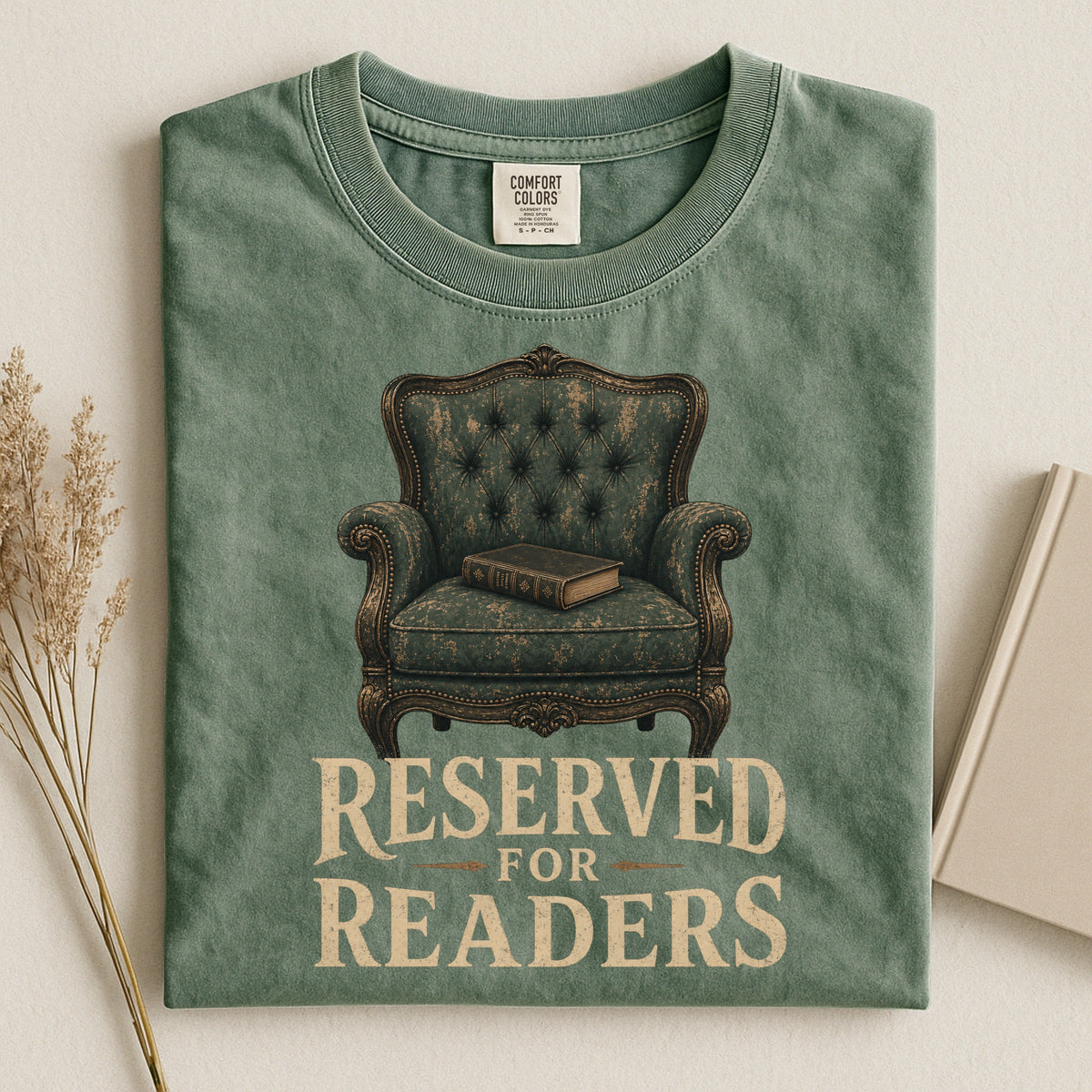Shelf Love Studio Reserved for Readers t-shirt in Moss, styled flat lay