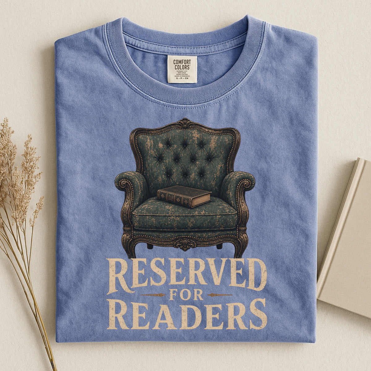 Shelf Love Studio Reserved for Readers t-shirt in Blue Jean, styled flat lay