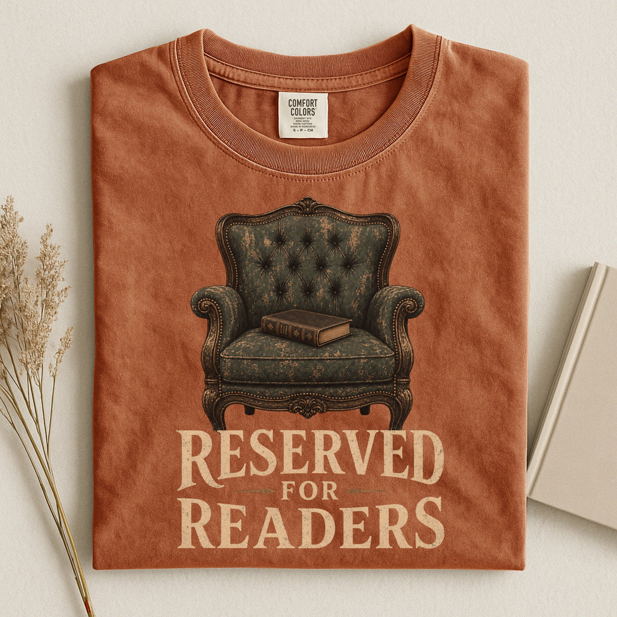 Shelf Love Studio Reserved for Readers t-shirt in Yam, styled flat lay