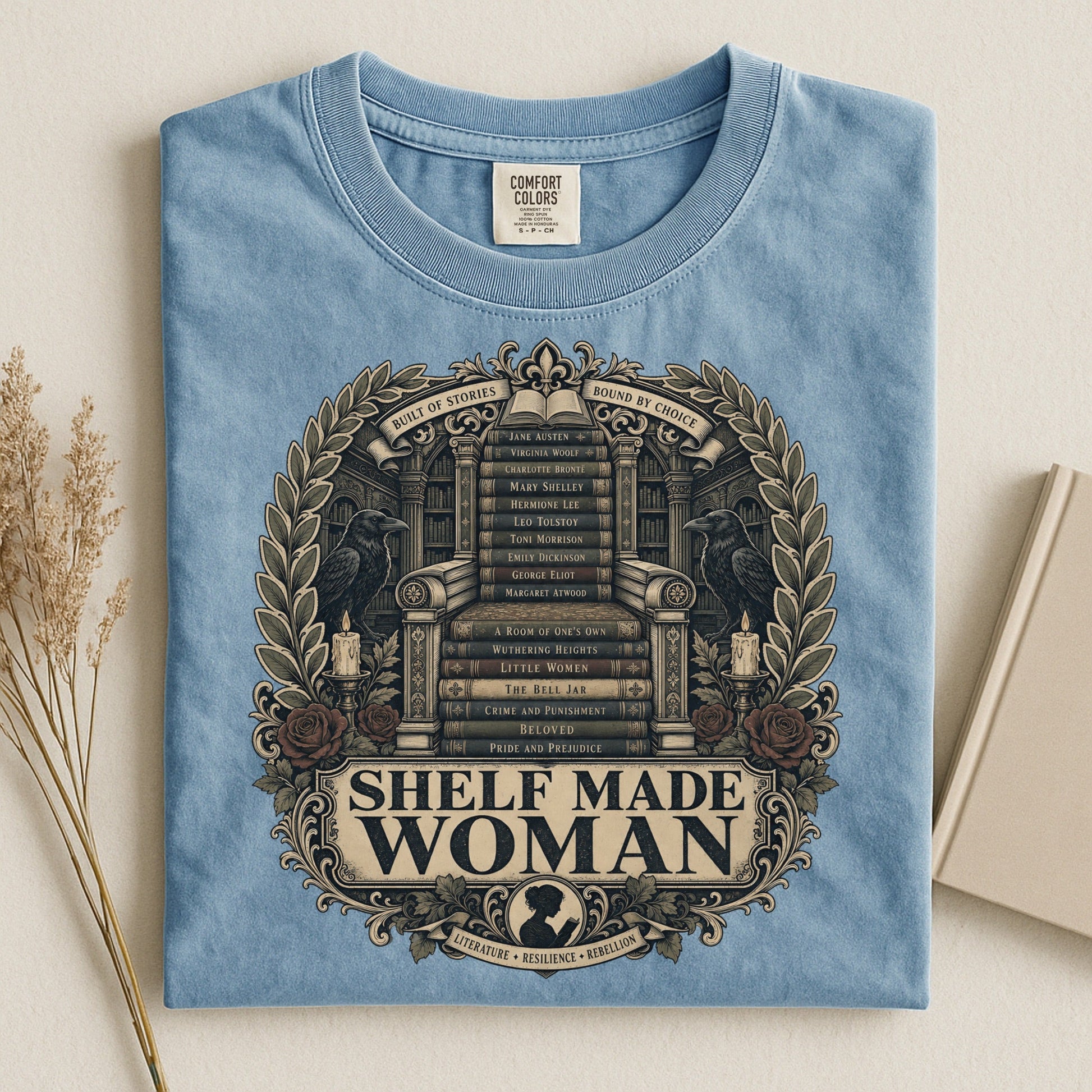 Shelf Made Woman bookish tee in Ice Blue, flat lay