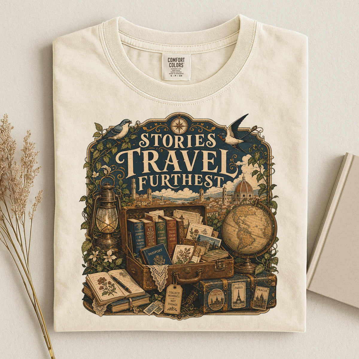 Stories Travel Furthest bookish tee in Ivory, flat lay