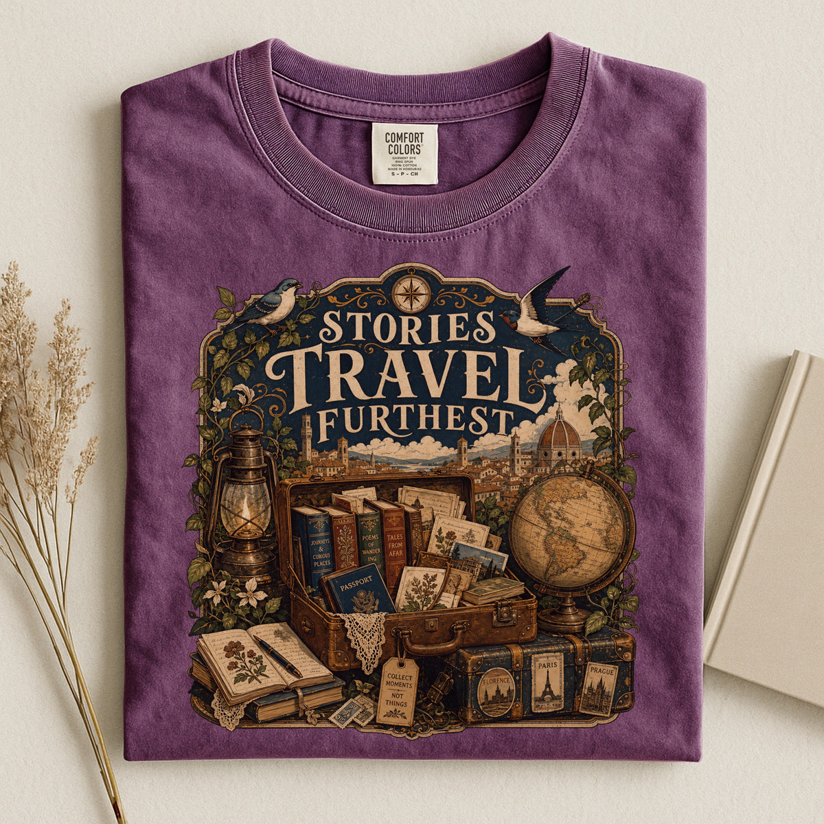 Stories Travel Furthest bookish tee in Berry, flat lay