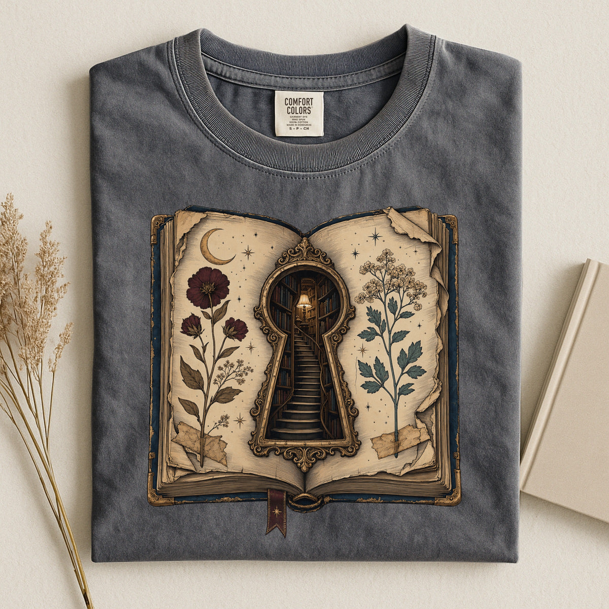 Shelf Love Studio Surreal Keyhole Book t-shirt in Pepper, styled flat lay