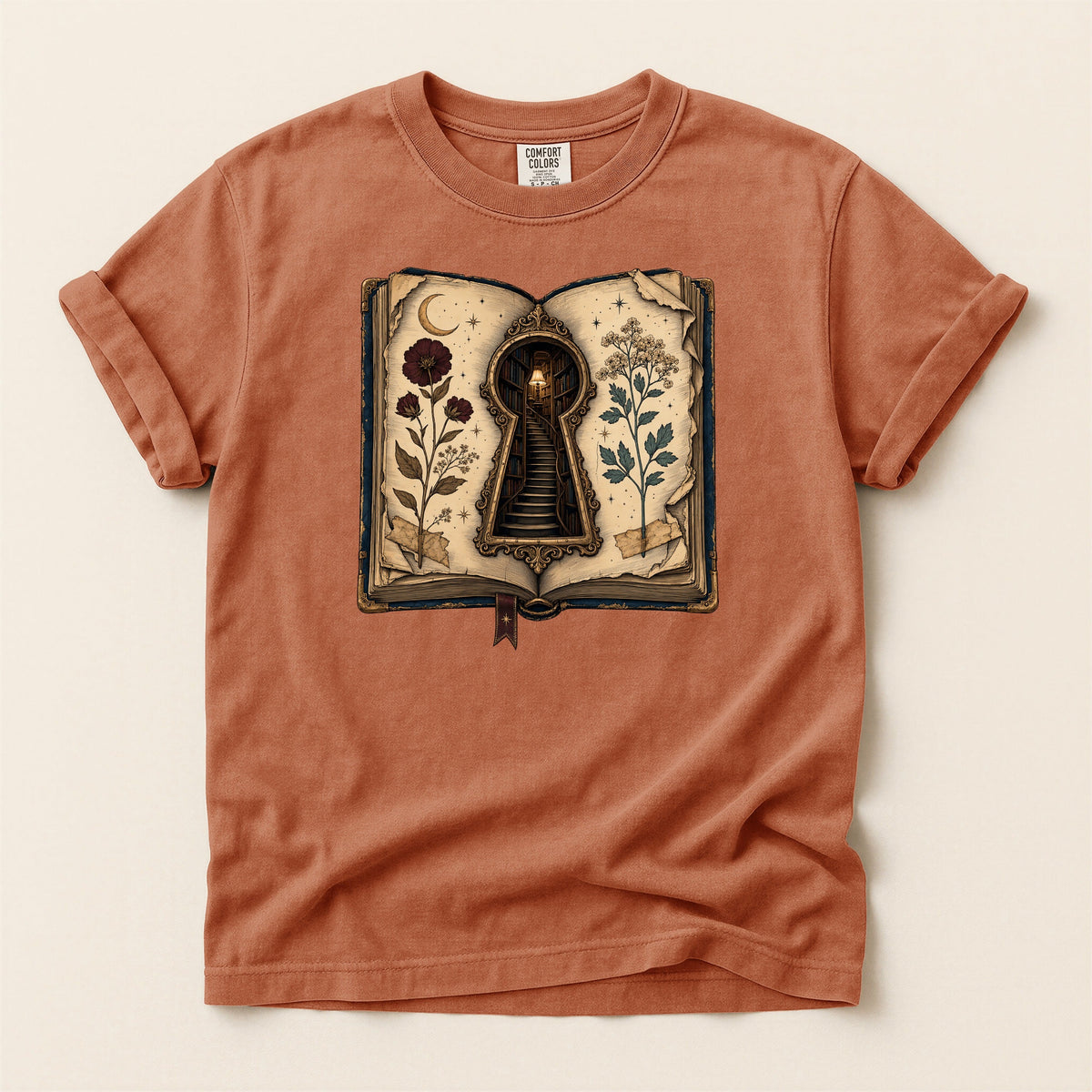 Shelf Love Studio Surreal Keyhole Book t-shirt in Yam, flat