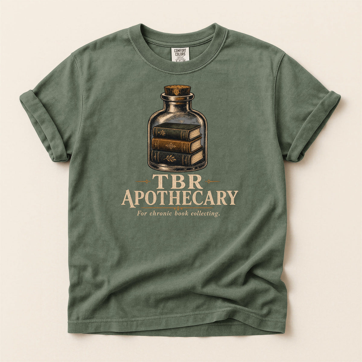 Shelf Love Studio TBR Apothecary t-shirt in Moss, flat