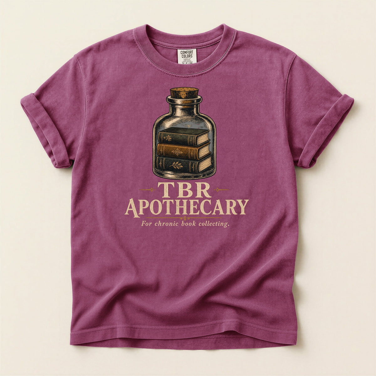 Shelf Love Studio TBR Apothecary t-shirt in Berry, flat