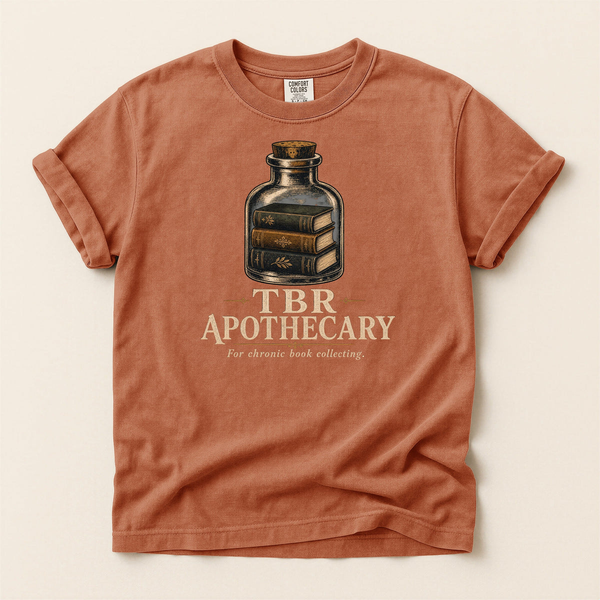 Shelf Love Studio TBR Apothecary t-shirt in Yam, flat