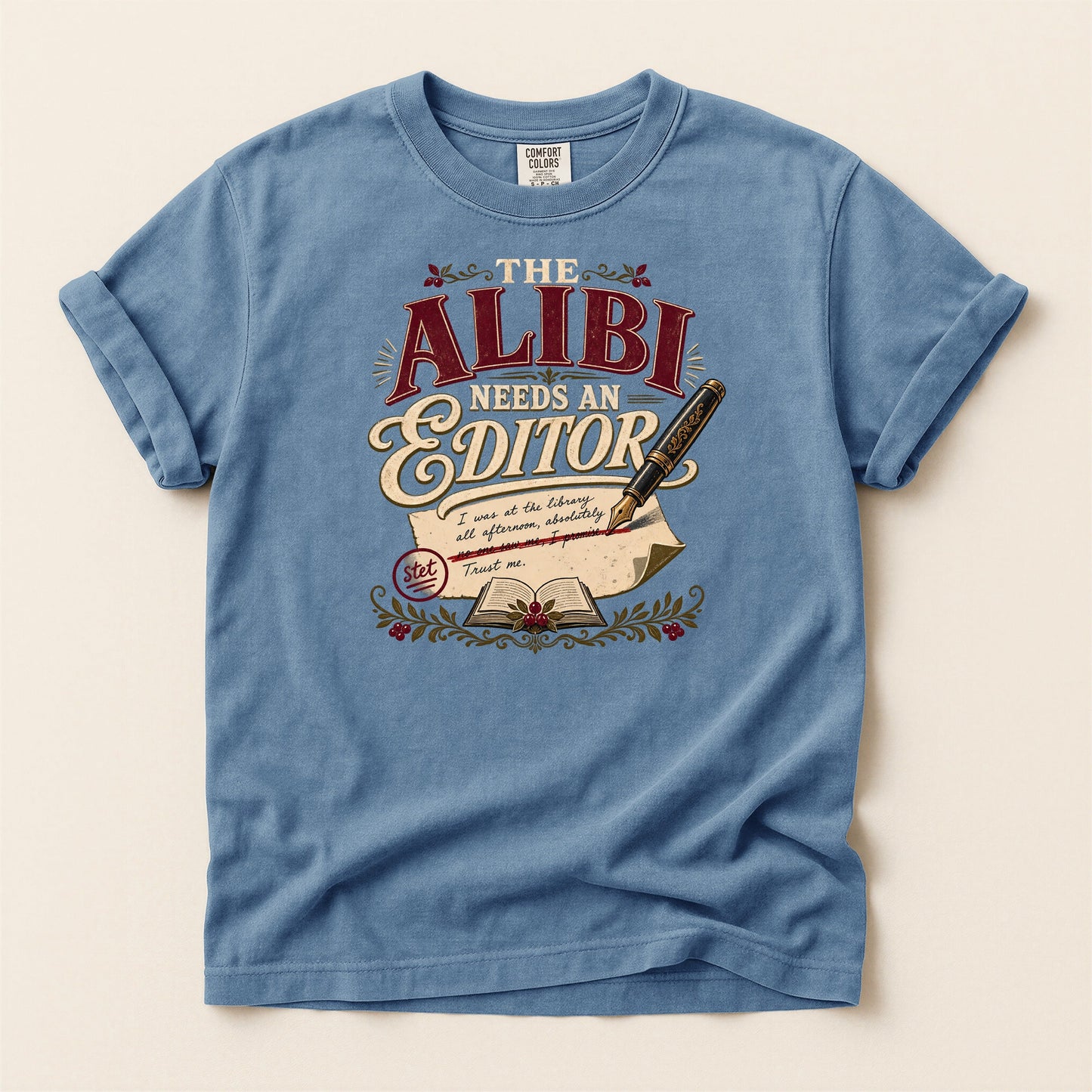 The Alibi Needs an Editor bookish tee in Blue Jean, full flat