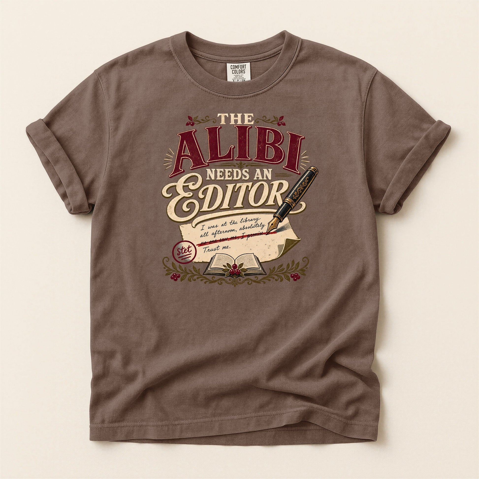 The Alibi Needs an Editor bookish tee in Espresso, full flat
