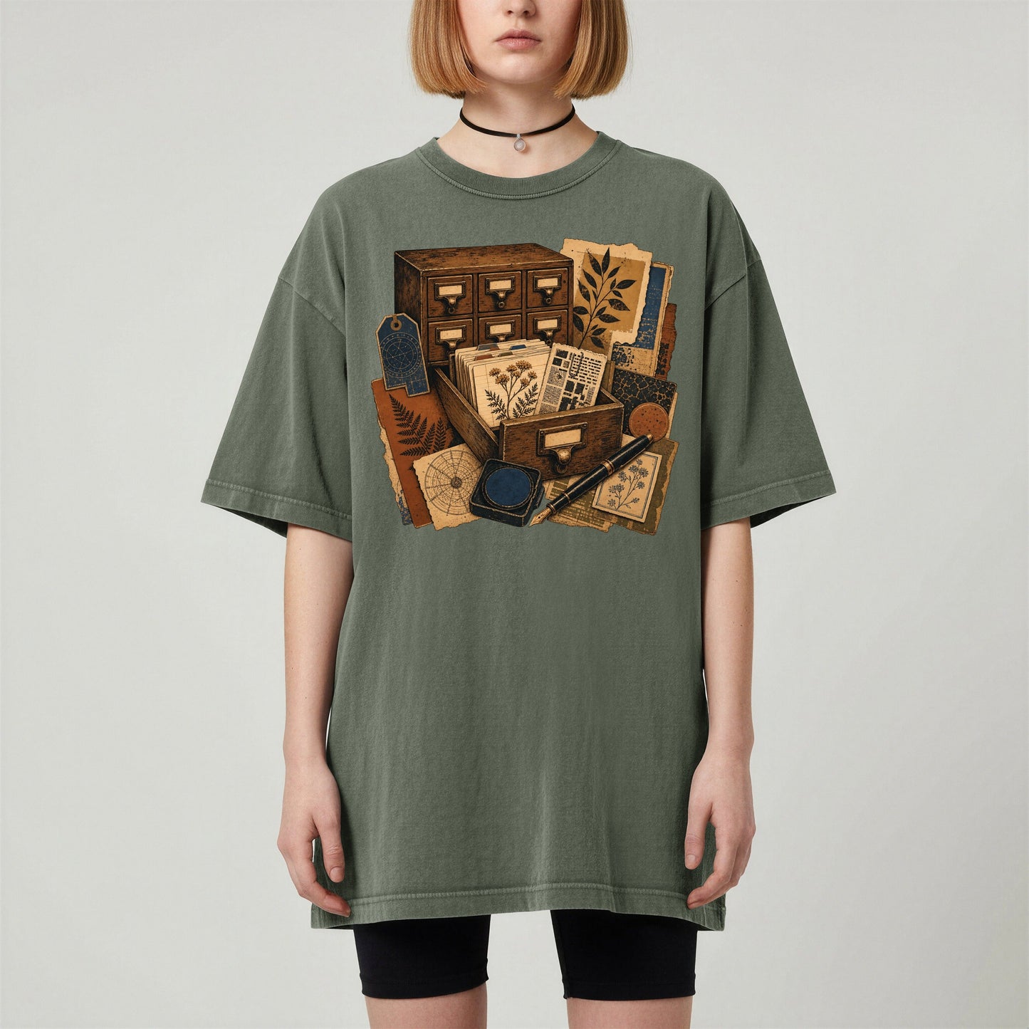 The Card Catalog bookish tee in Moss, worn