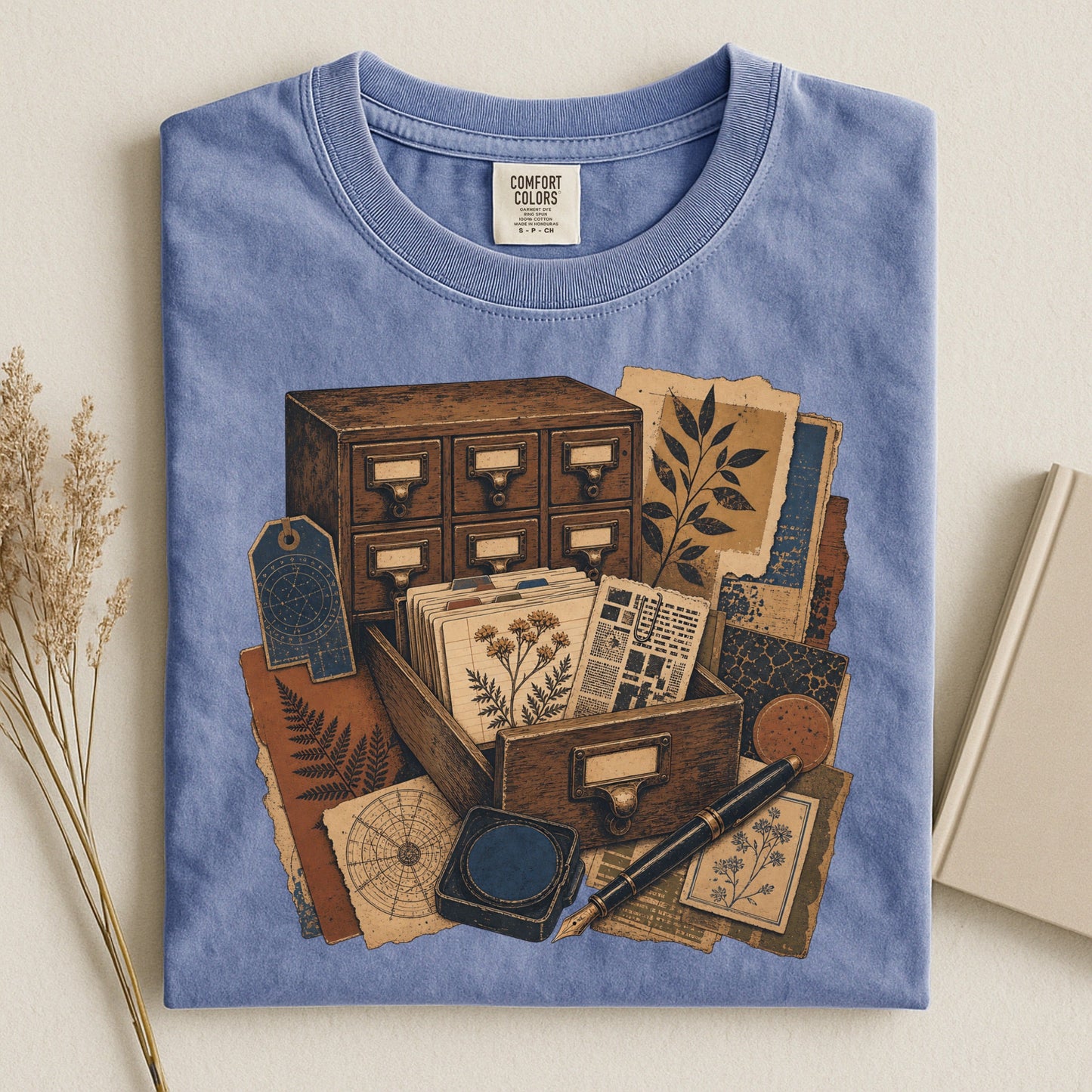 The Card Catalog bookish tee in Blue Jean, flat lay