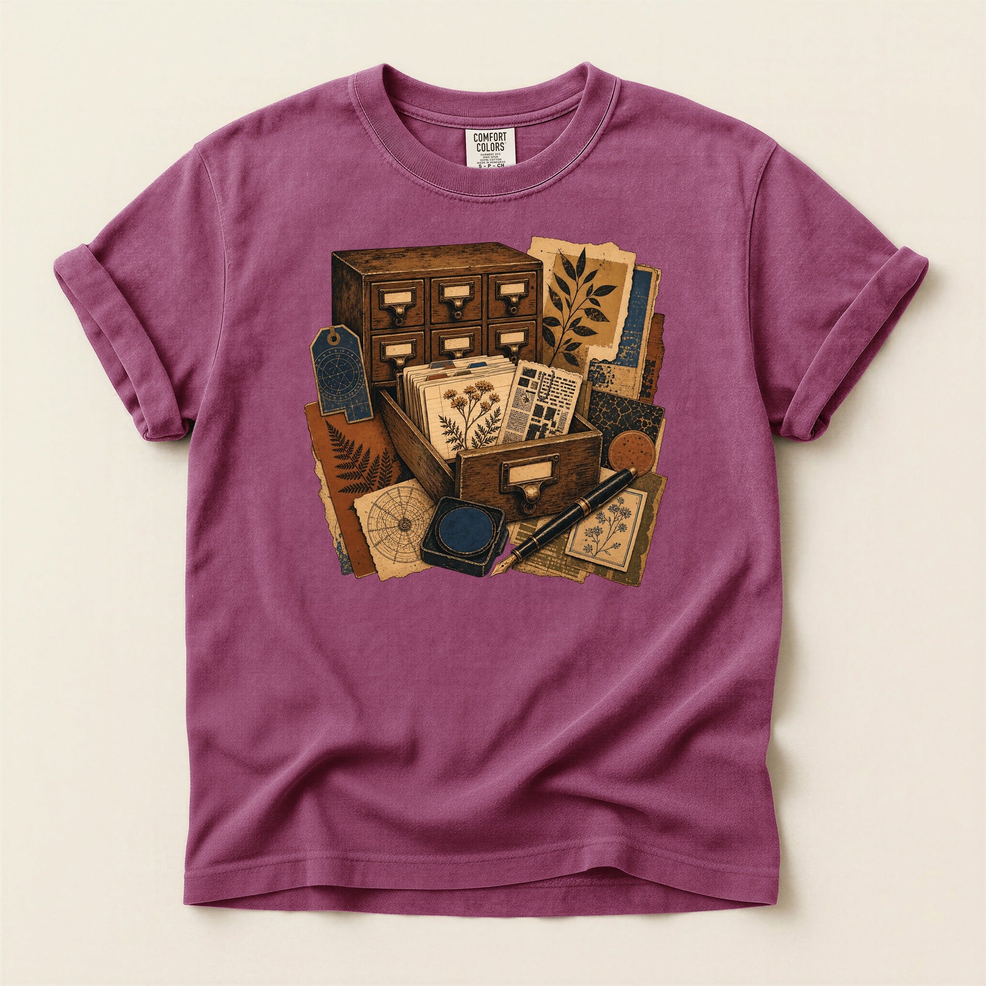 The Card Catalog bookish tee in Berry, full flat