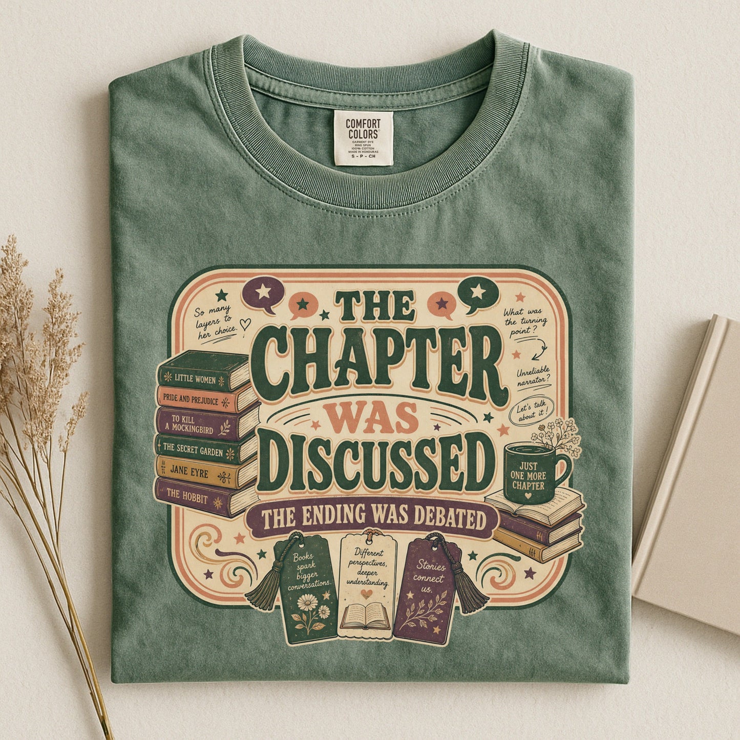 The Chapter Was Discussed bookish tee in Moss, flat lay