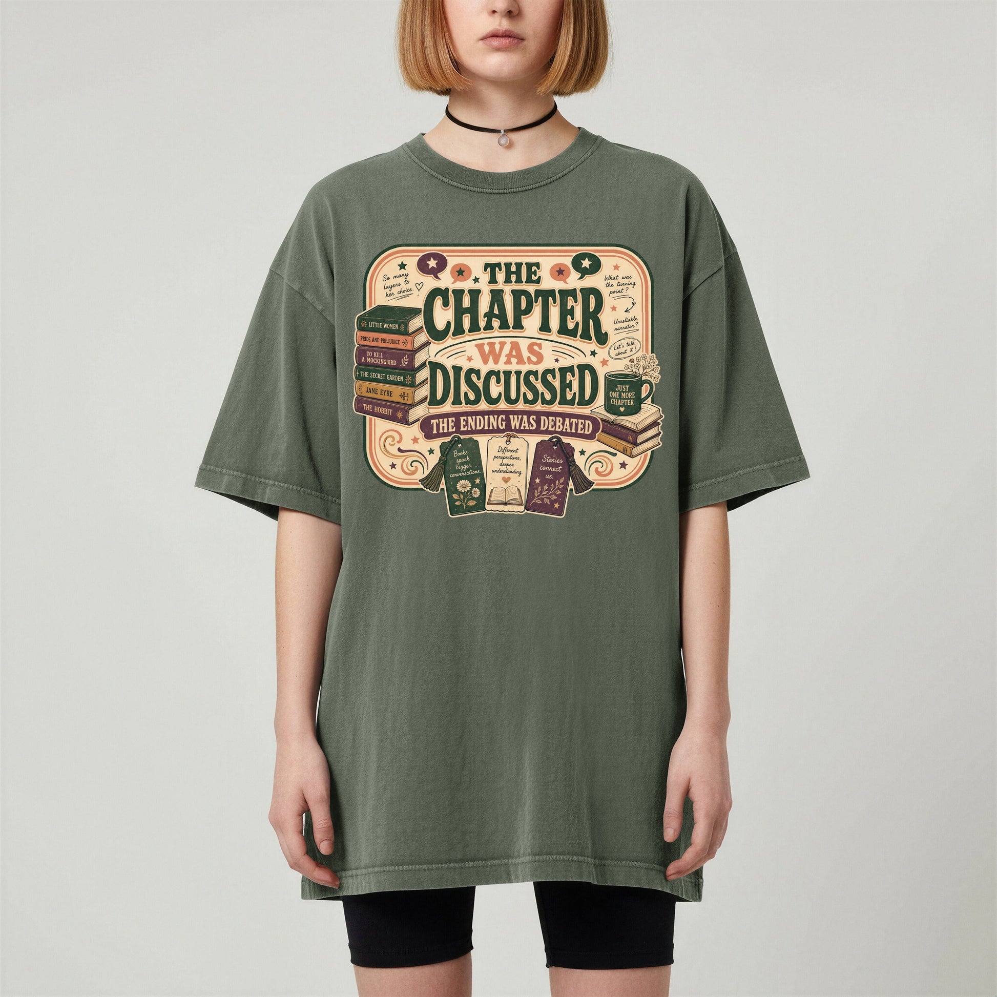 The Chapter Was Discussed bookish tee in Moss, worn