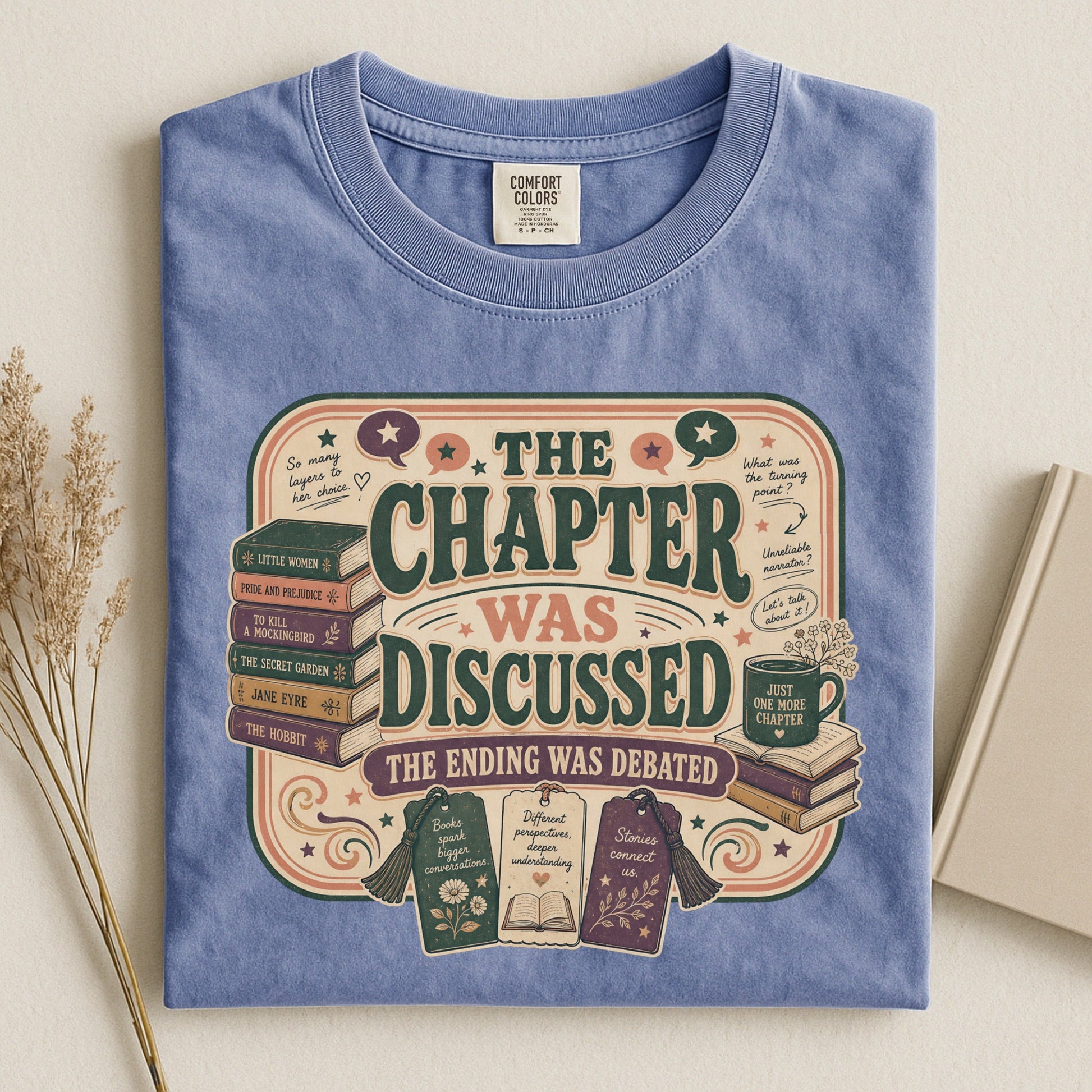 The Chapter Was Discussed bookish tee in Blue Jean, flat lay