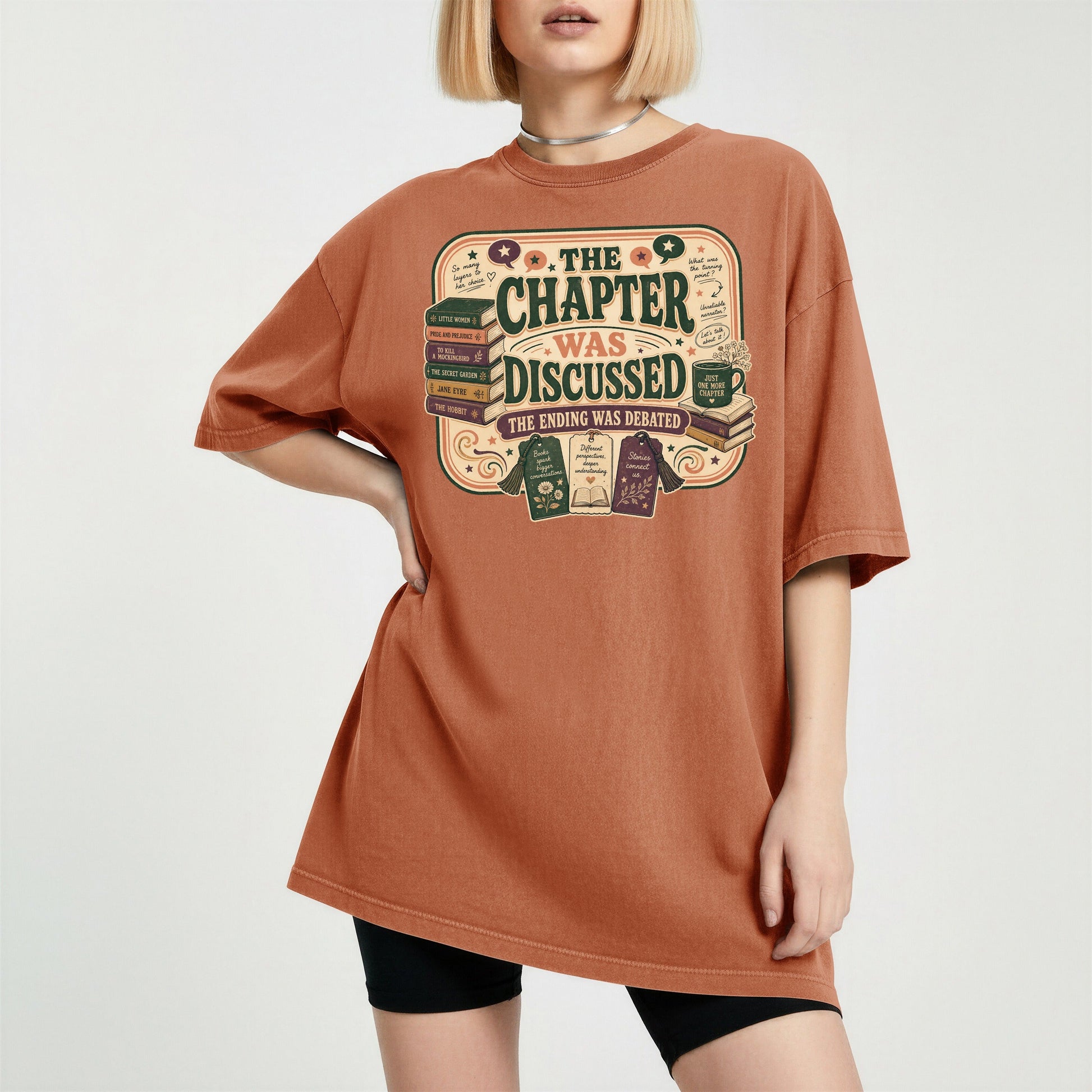 The Chapter Was Discussed bookish tee in Yam, worn