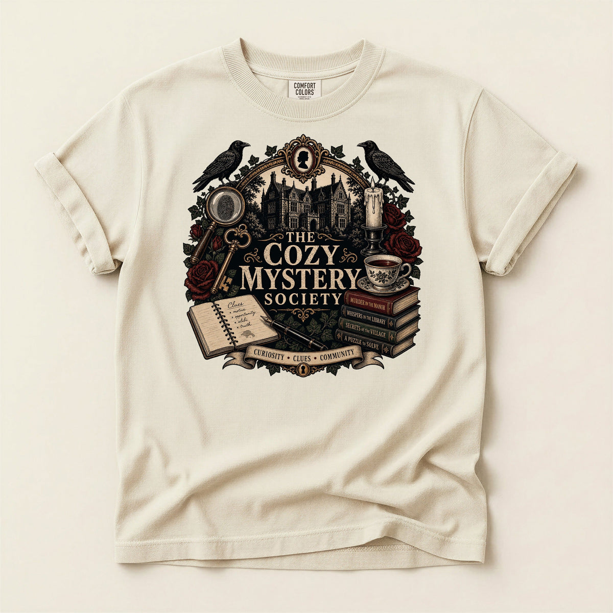 The Cozy Mystery Society bookish tee in Ivory, full flat