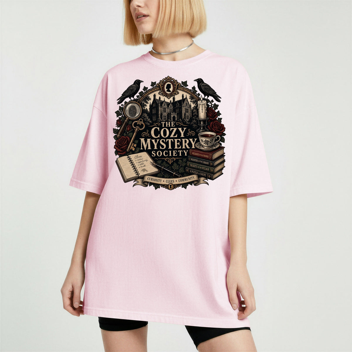 The Cozy Mystery Society bookish tee in Blossom, worn