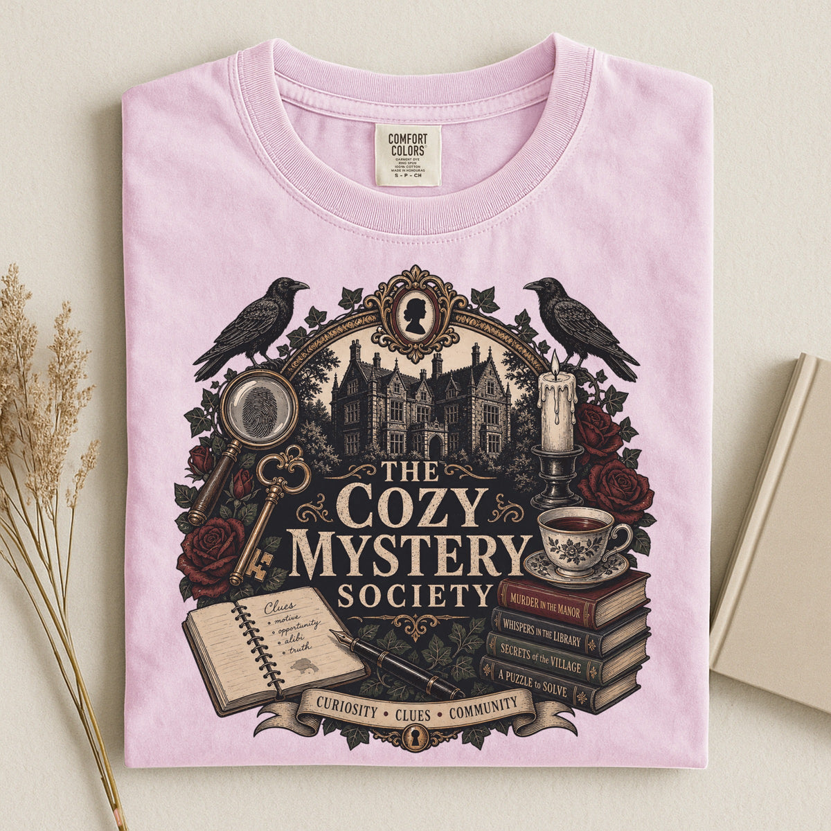 The Cozy Mystery Society bookish tee in Blossom, flat lay