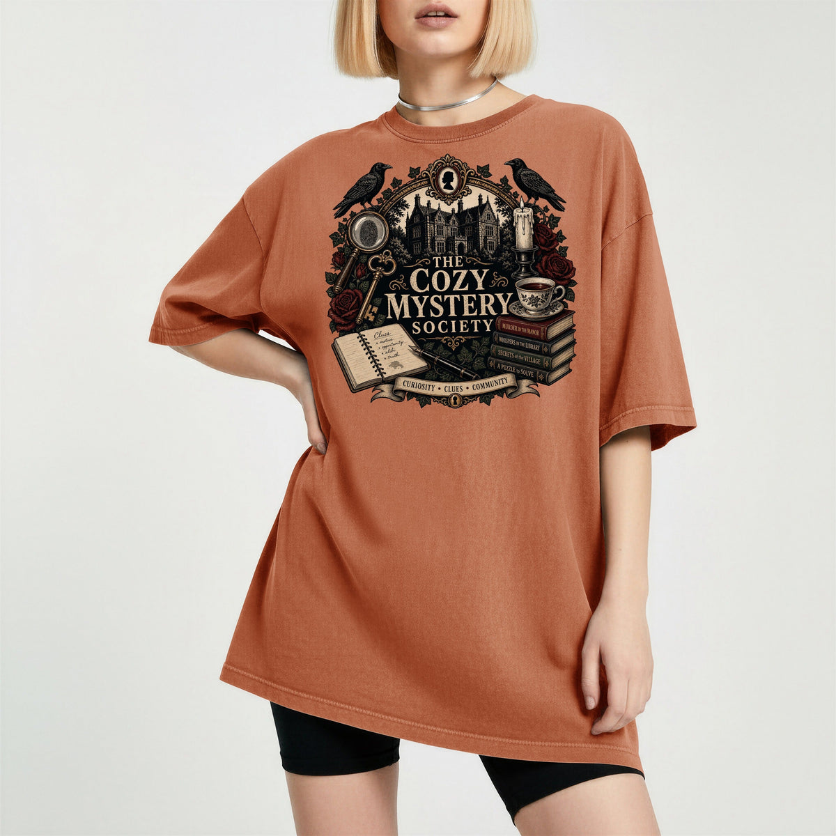 The Cozy Mystery Society bookish tee in Yam, worn