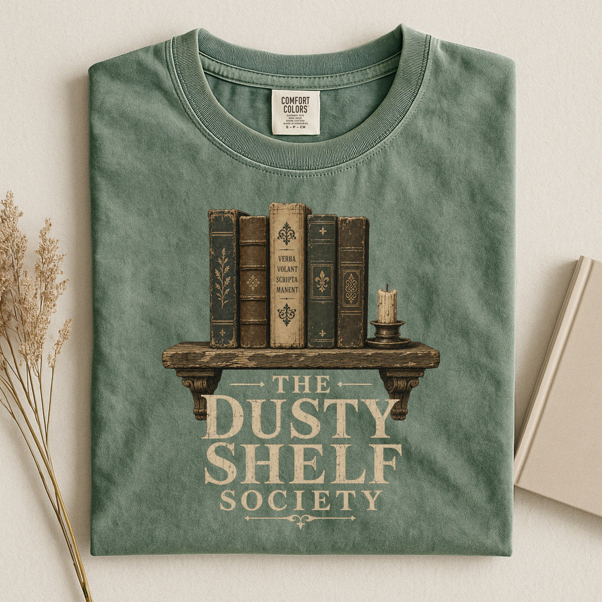 Shelf Love Studio The Dusty Shelf Society t-shirt in Moss, styled flat lay