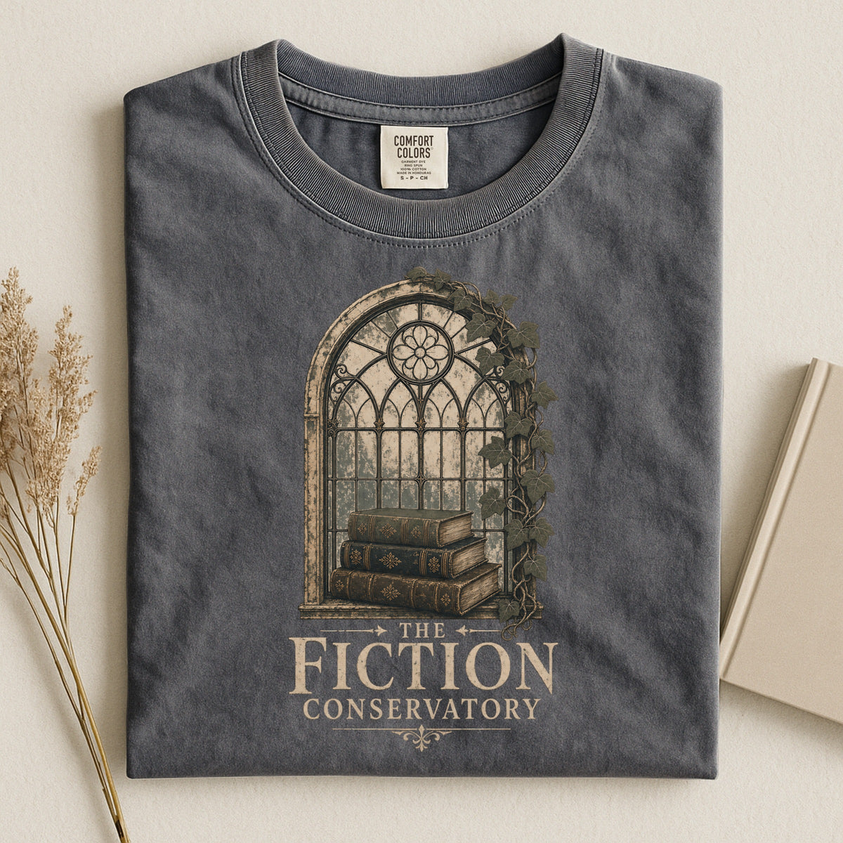 Shelf Love Studio The Fiction Conservatory t-shirt in Pepper, styled flat lay