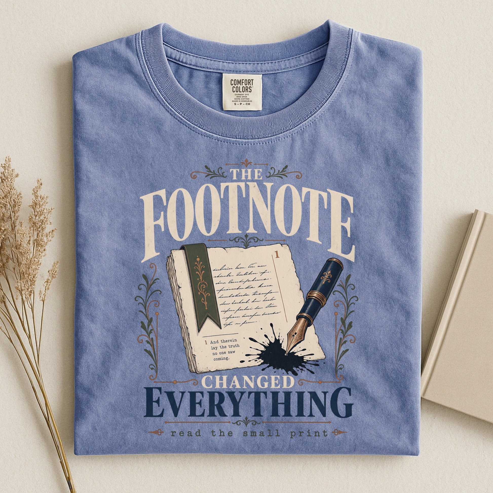 The Footnote Changed Everything bookish tee in Blue Jean, flat lay