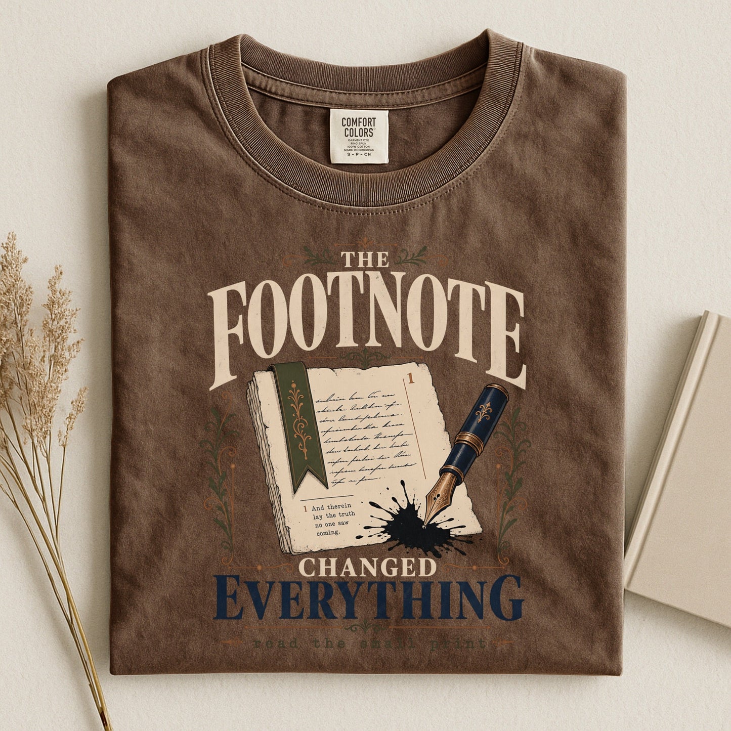 The Footnote Changed Everything bookish tee in Espresso, flat lay
