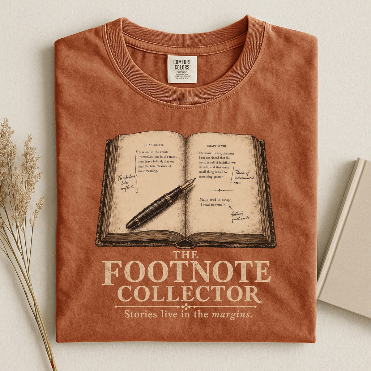Shelf Love Studio The Footnote Collector t-shirt in Yam, styled flat lay