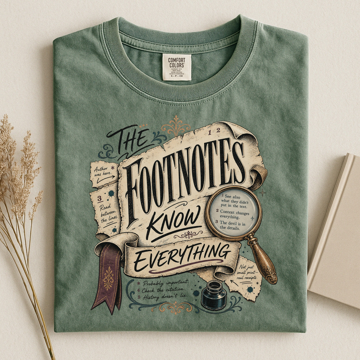 Shelf Love Studio The Footnotes Know Everything t-shirt in Moss, styled flat lay