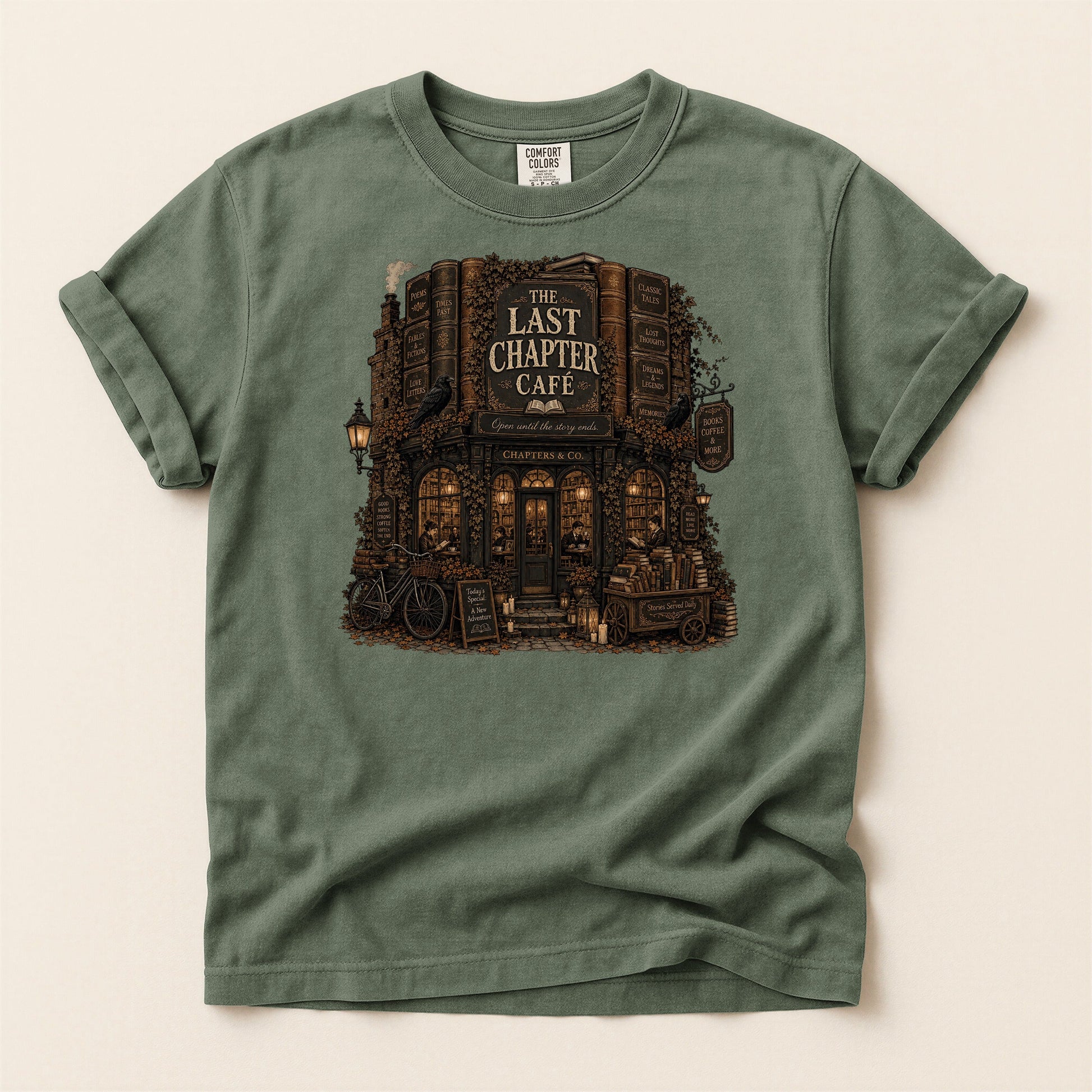 The Last Chapter Cafe bookish tee in Moss, full flat