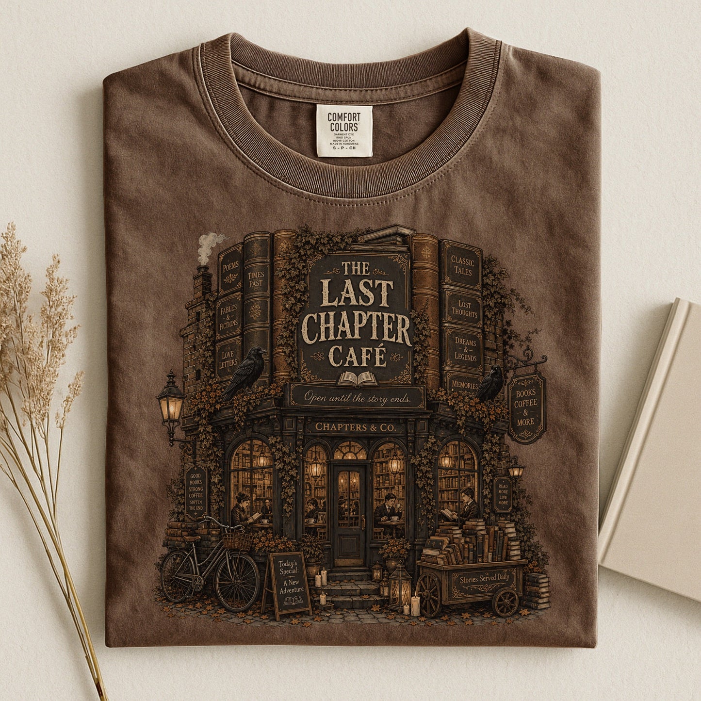 The Last Chapter Cafe bookish tee in Espresso, flat lay