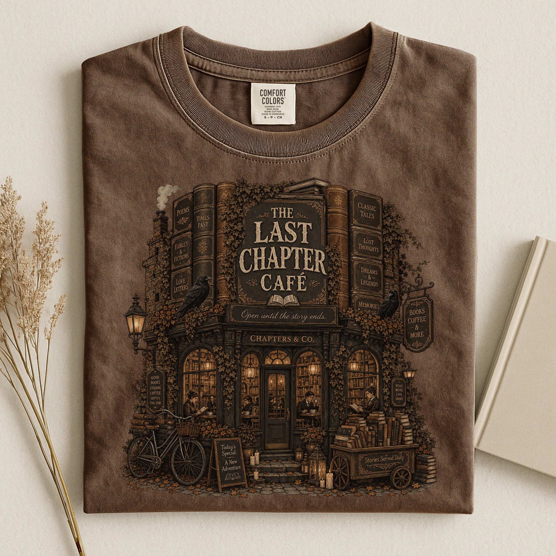 The Last Chapter Cafe bookish tee in Espresso, flat lay