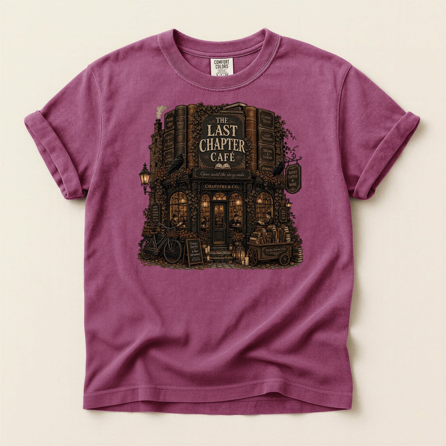 The Last Chapter Cafe bookish tee in Berry, full flat