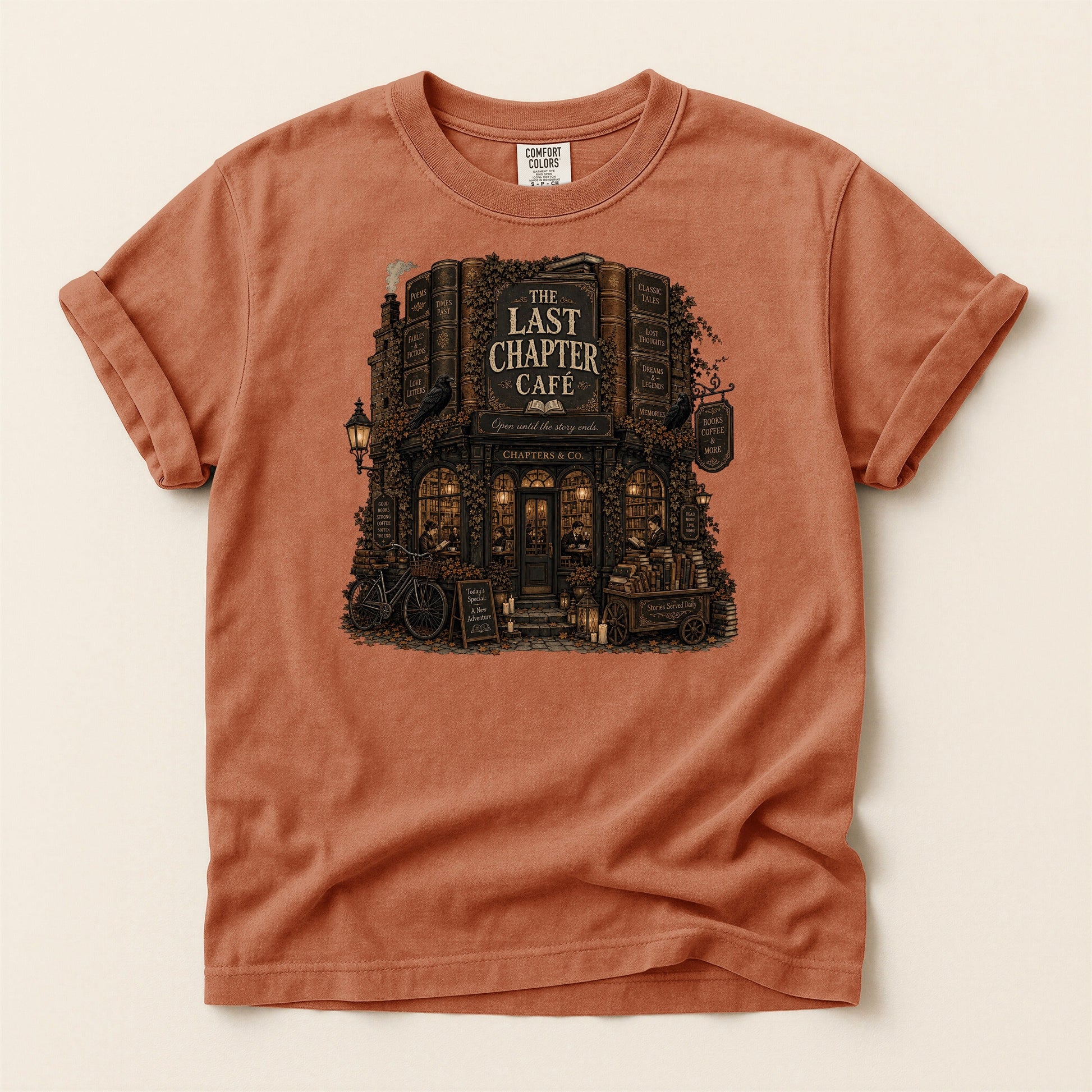 The Last Chapter Cafe bookish tee in Yam, full flat