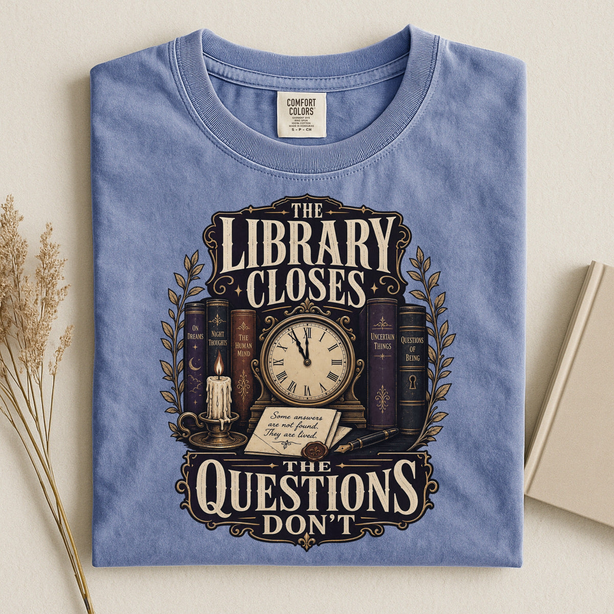 Shelf Love Studio The Library Closes t-shirt in Blue Jean, styled flat lay