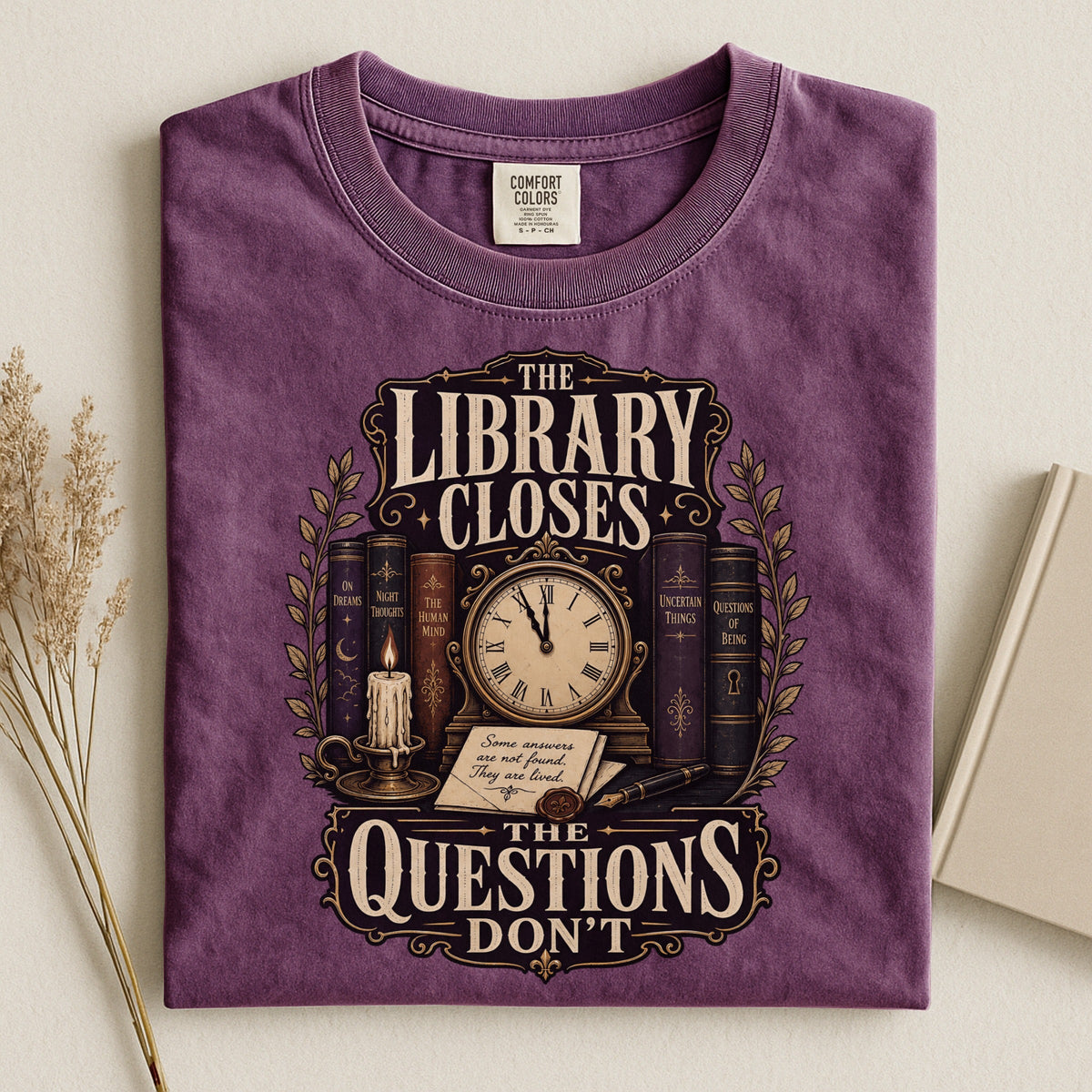Shelf Love Studio The Library Closes t-shirt in Berry, styled flat lay
