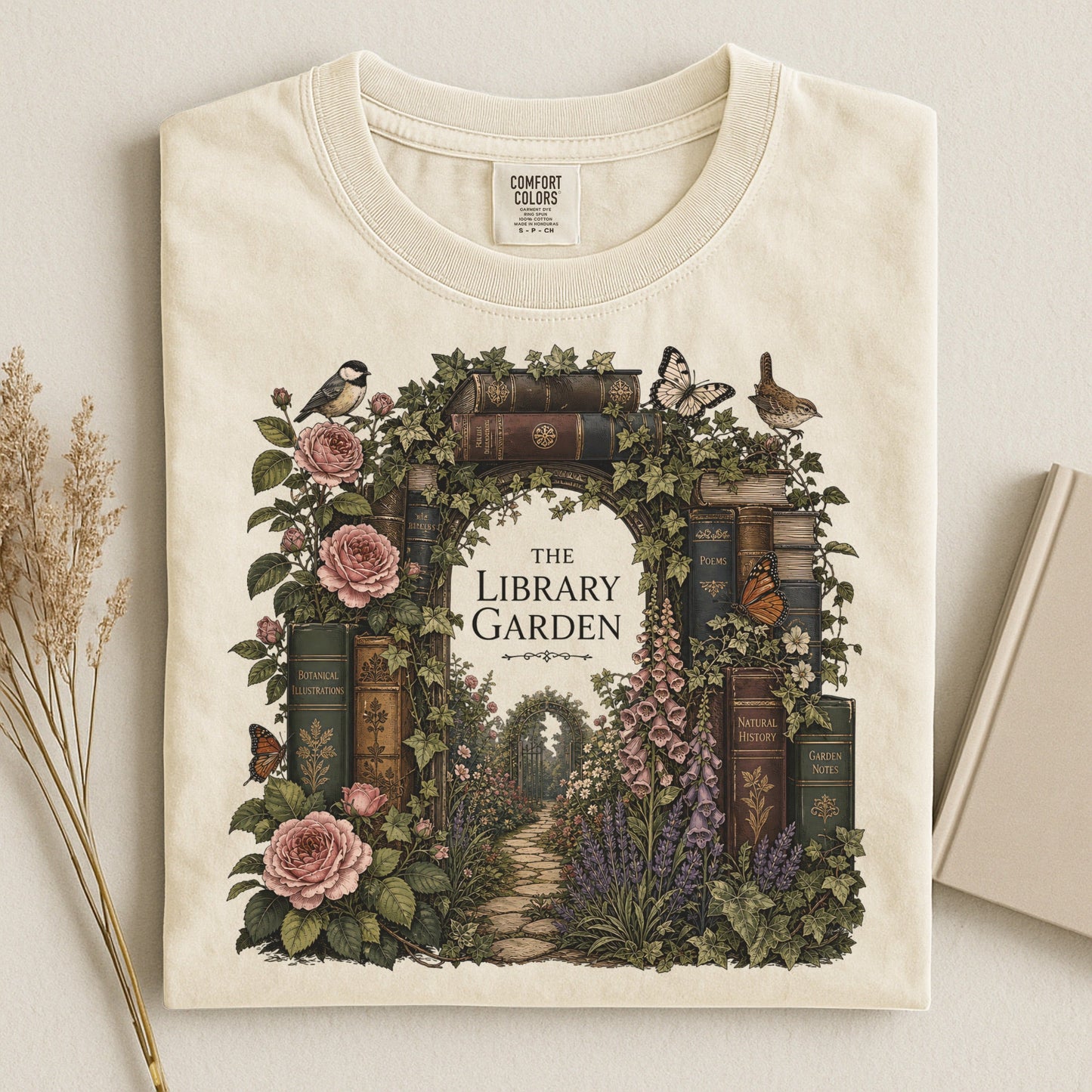 The Library Garden bookish tee in Ivory, flat lay