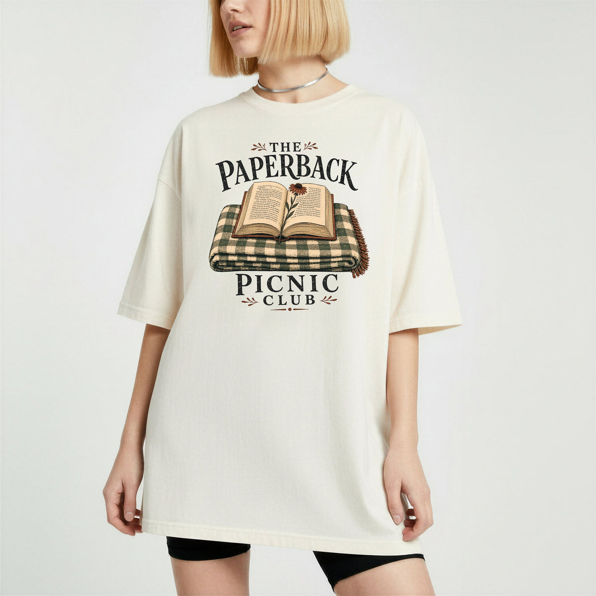 Shelf Love Studio The Paperback Picnic Club t-shirt in Ivory, worn