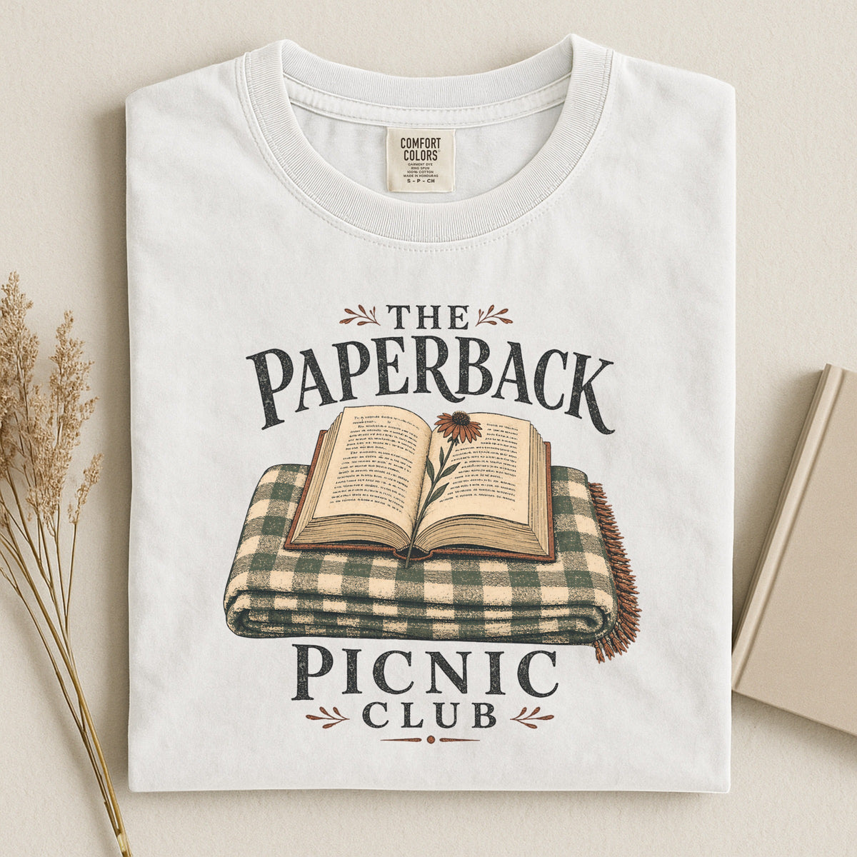 Shelf Love Studio The Paperback Picnic Club t-shirt in White, styled flat lay