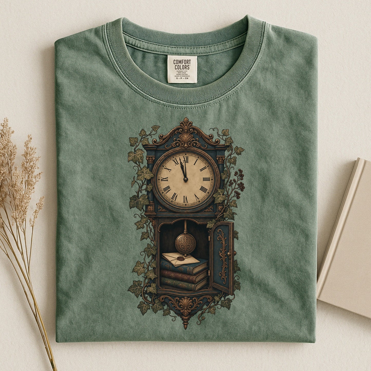 The Reading Hour bookish tee in Moss, flat lay