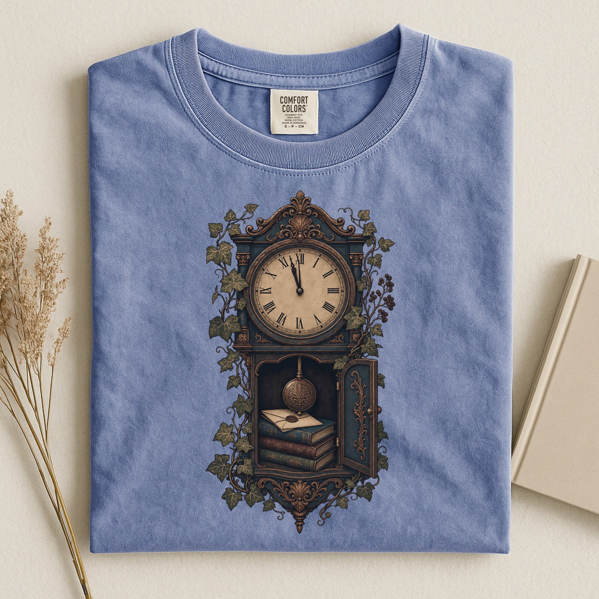 The Reading Hour bookish tee in Blue Jean, flat lay