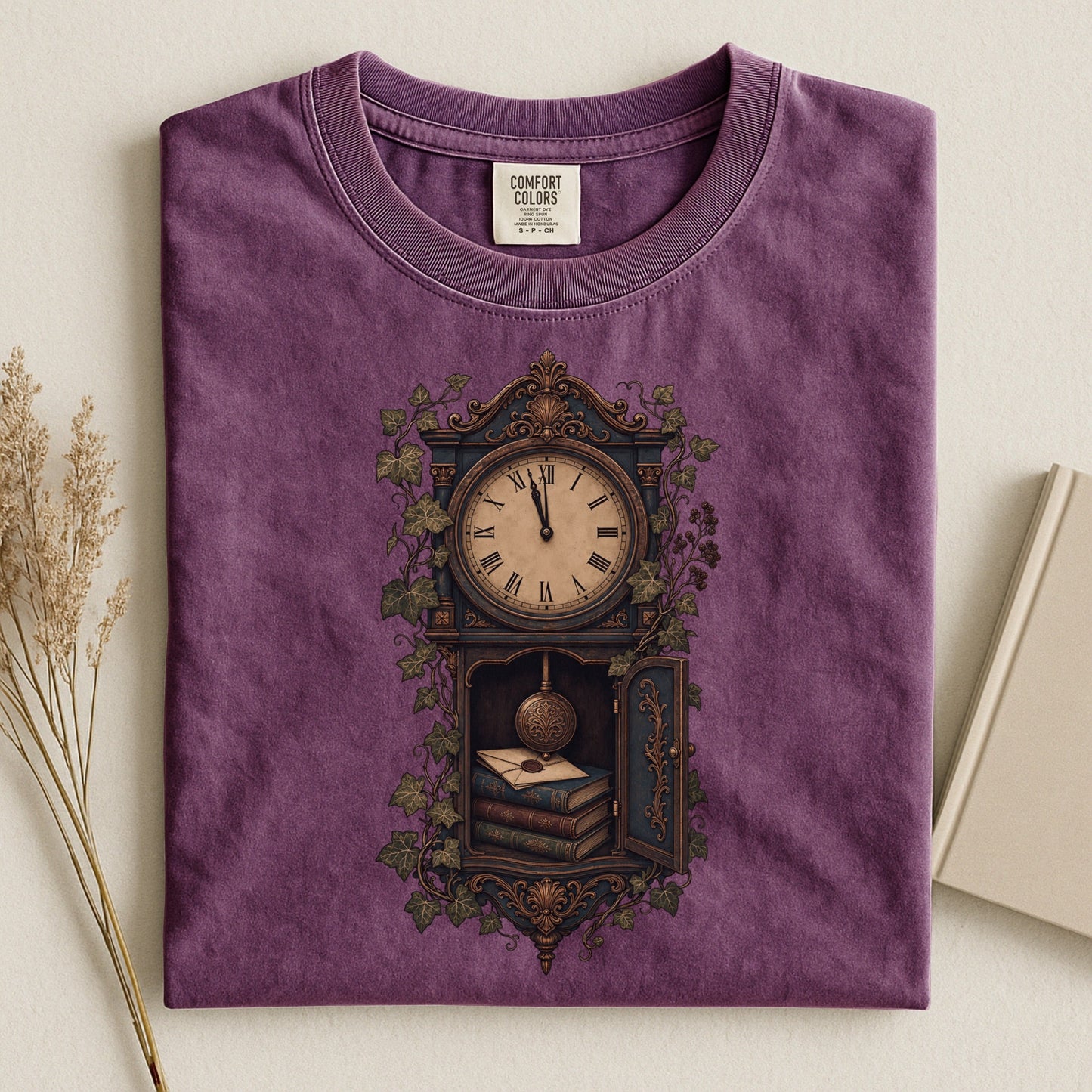 The Reading Hour bookish tee in Berry, flat lay